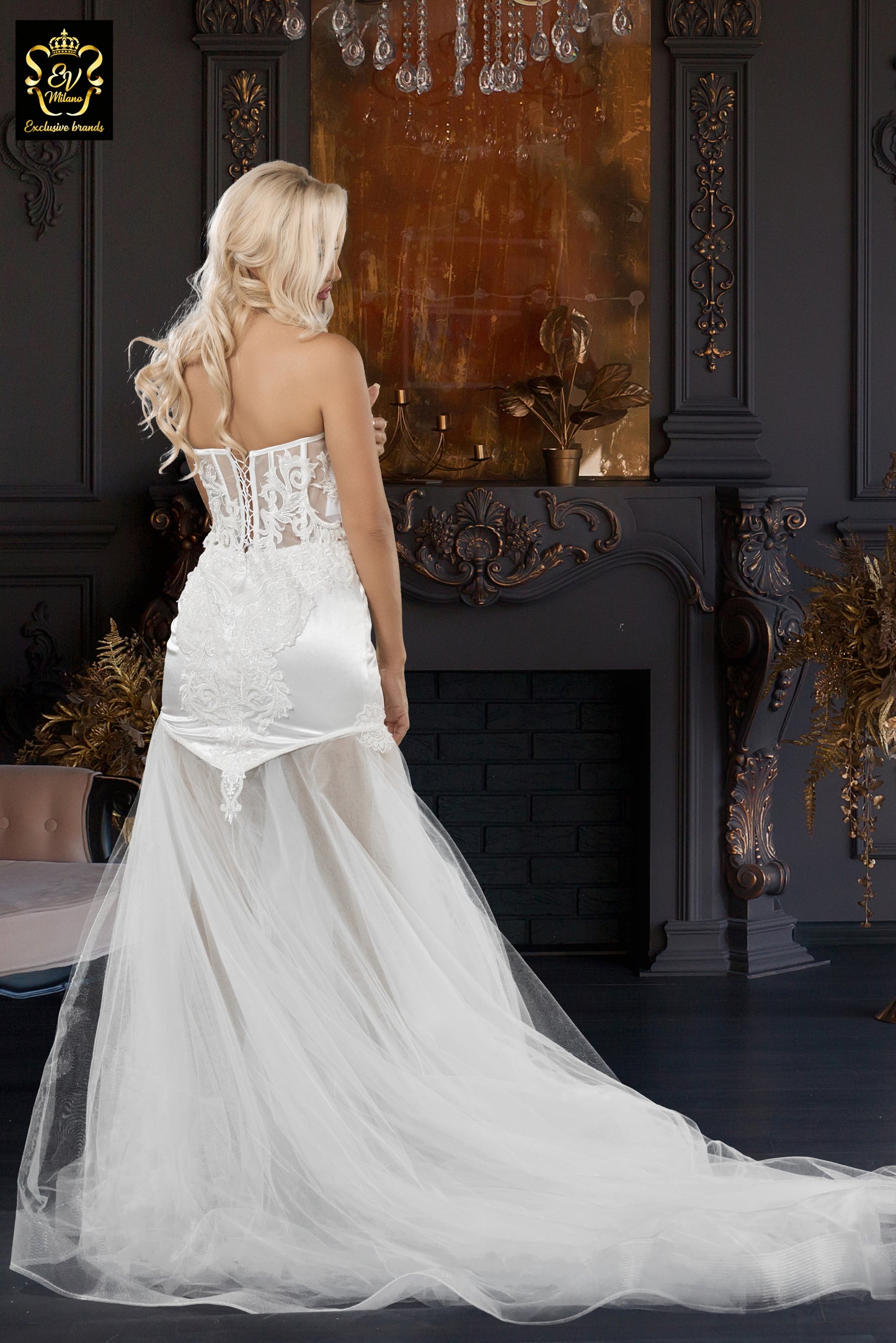 Long wedding dress with semi-transparent model and tulle train EVM-1024